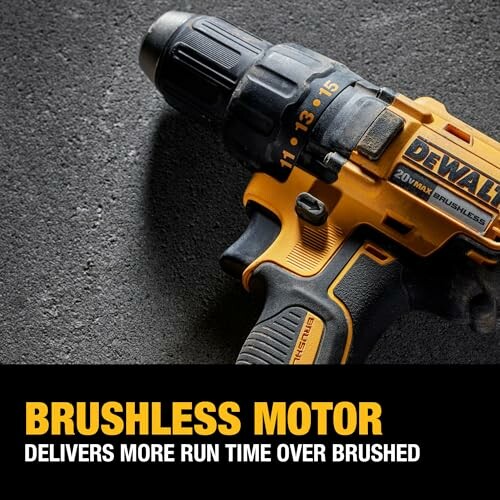 Dewalt brushless motor drill on textured surface.