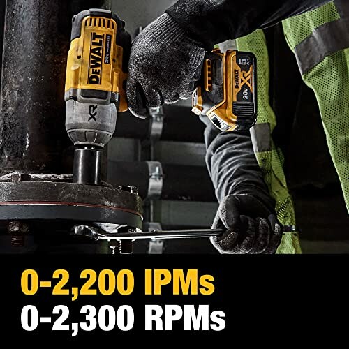 Person using DeWalt impact wrench on machinery with performance specs displayed.